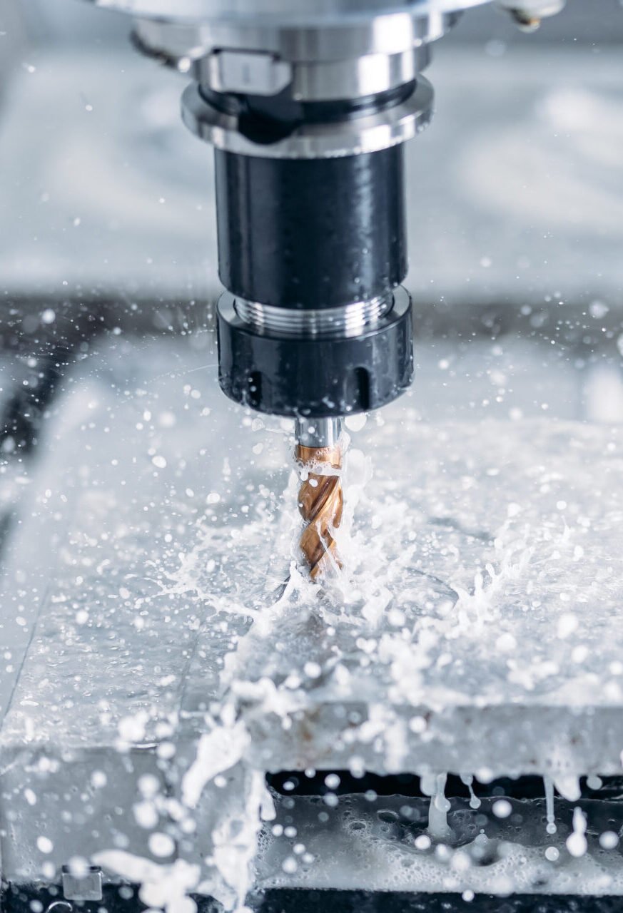 Process working CNC turning cutting milling metal Industry machine iron tools with splash water Person wearing a wristband